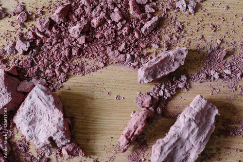 Detail of pink clay powder from a sculpture photo