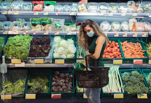 Young Woman Buying Groceries in the Supermarket
