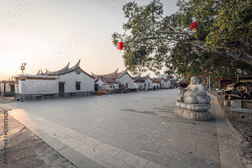 Landscapes with old buildings in Daimei village, a traditional Chinese village with neat rows of houses in Zhangzhou, Fujian, China photo