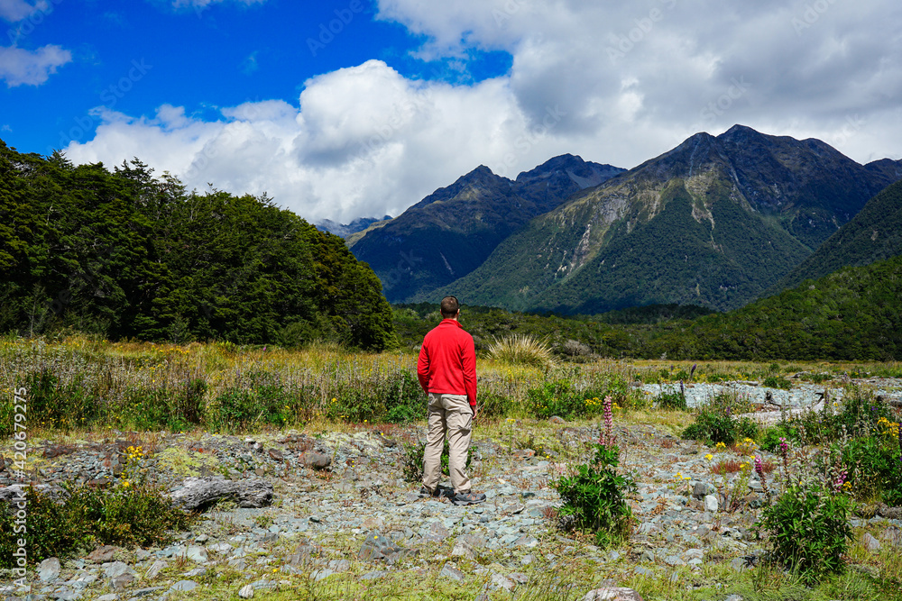 A lone hiker near Milford Sound in New Zealand