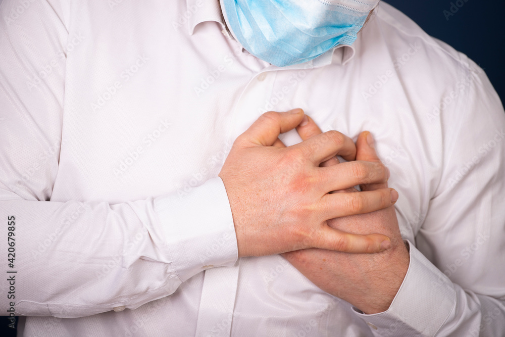 Heart attack concept. Man suffering from chest pain, closeup Heart attack concept. Man suffering from chest pain, closeup
