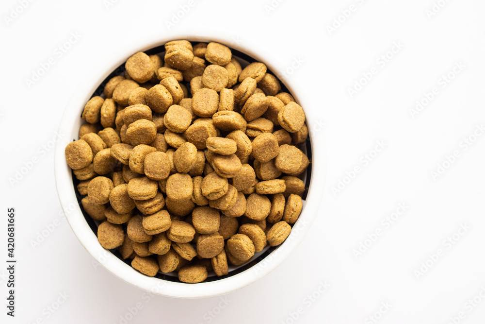 Dried Pet Food isolated On White Background with copy space Dried Pet Food isolated On White Background with copy space