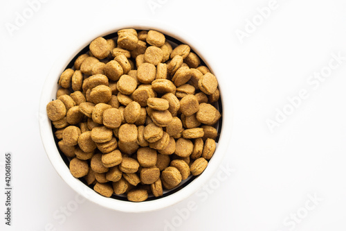 Dried Pet Food   isolated On White Background with copy space © Tetiana