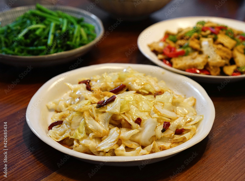 Home made Chinese food spicy fried cabbage, on the dining table Japanese atmosphere home environment Home made Chinese food spicy fried cabbage, on the dining table Japanese atmosphere home environment