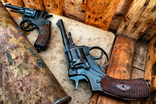 weapons of the Second World War - pistols, projectile, blurred image photo