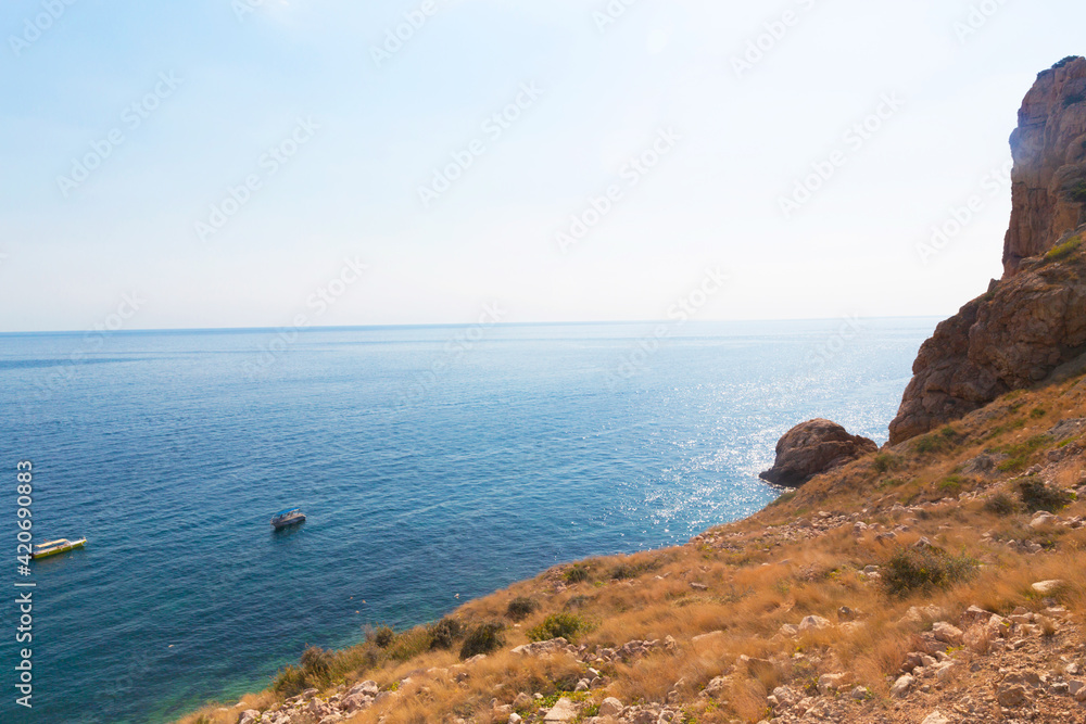 Beautiful sea landscape with mountains and coniferous trees