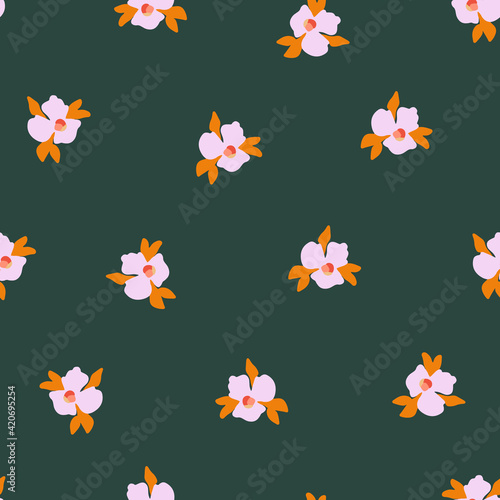 Seamless vector pattern Ditsy pansy flowers. Delicate pink small scattered flowers on a green background. Cute romantic Folk art flowers for fabric  nursery  home decor  wallpaper  spring decor.