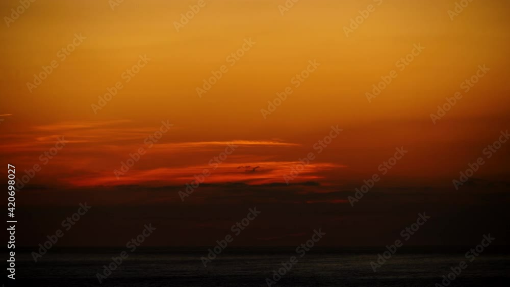 Seascape at evening, sunset over sea water. Night is falling. Nature landscape in Andalusia Spain. Time laspe Seascape at evening, sunset over sea water. Night is falling. Nature landscape in Andalusia Spain. Time laspe