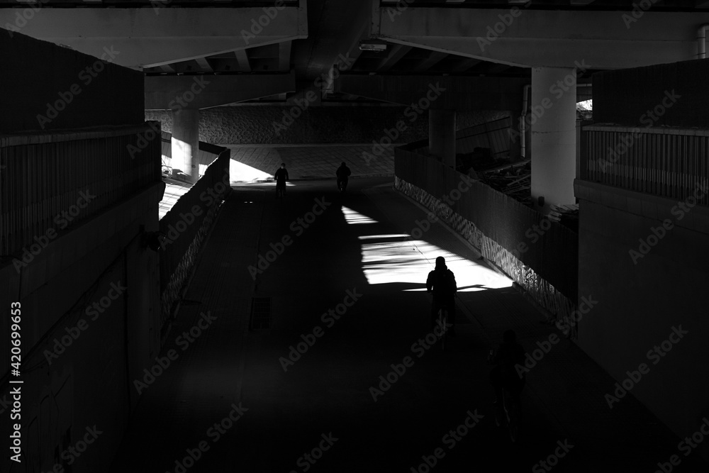 Silhouettes under the bridge Silhouettes under the bridge