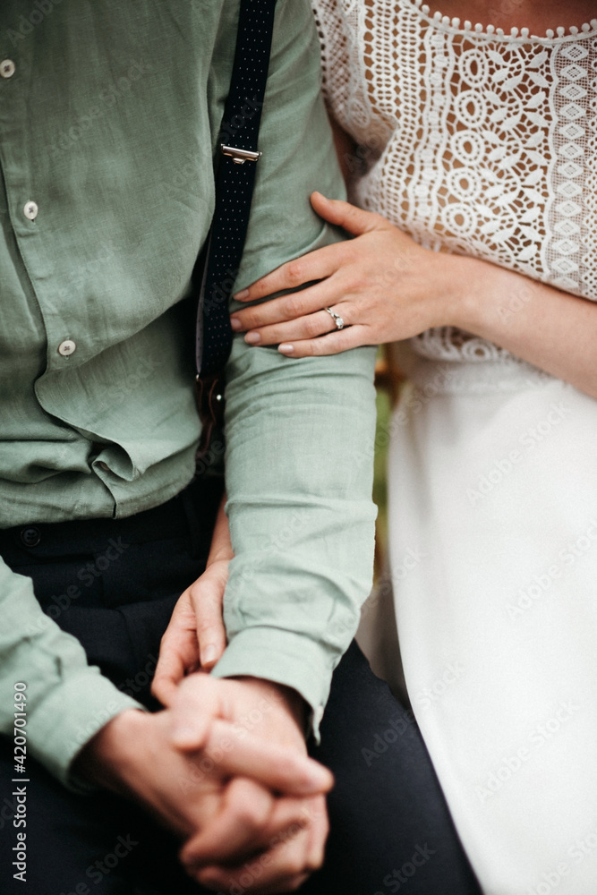 Bride holding groom tender Bride holding groom tender