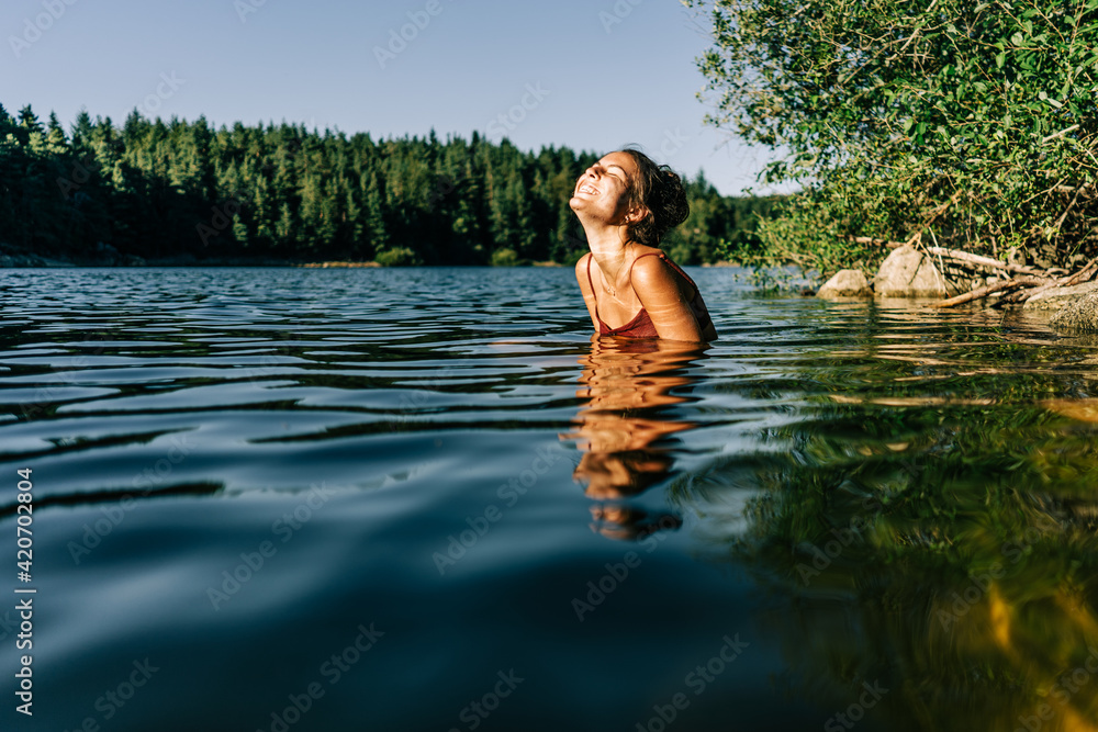 young woman in a lake young woman in a lake