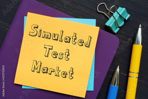Business concept meaning Simulated Test Market with inscription on the page.