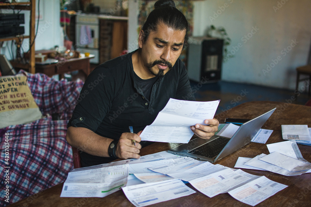 Man paying bills Man paying bills