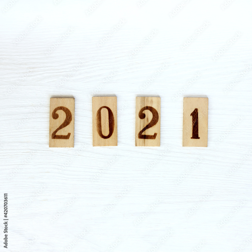 wooden plaques with numbers indicating the year. event in 2021 wooden plaques with numbers indicating the year. event in 2021