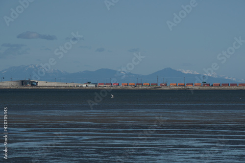 A picture of sand beach at low tide.   Tsawwassen BC Canada      © haseg77