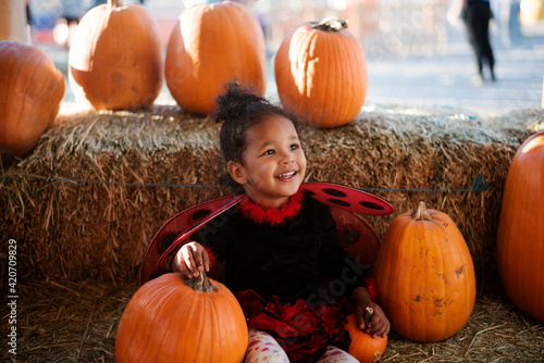 Toddler in ladybug costume photo