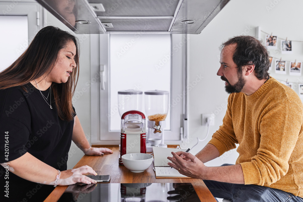 Young couple working from home Young couple working from home