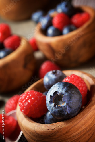 Raspberries and blueberries photo