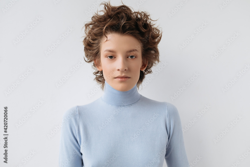 Androgynous teen model in trendy turtleneck Androgynous teen model in trendy turtleneck
