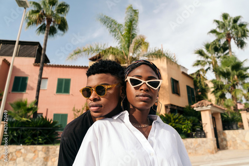 Young black brother and sister with sunglasses photo