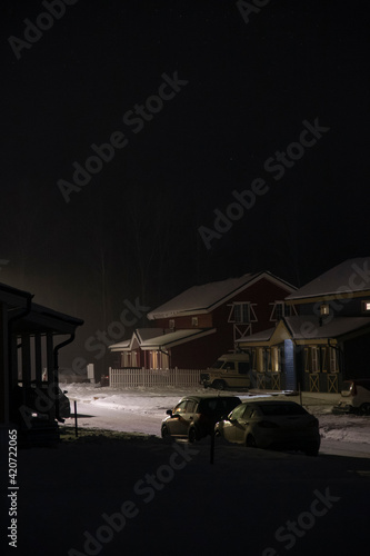 Dim street of village at night photo