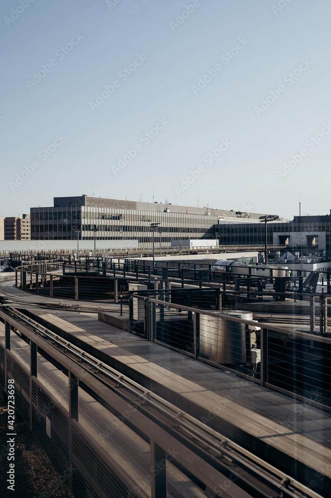 Modern buildings and paths against cloudless sky Modern buildings and paths against cloudless sky