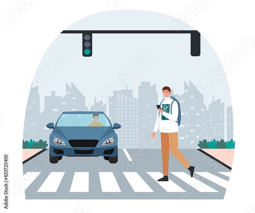 Pedestrian crossing road on red traffic lights