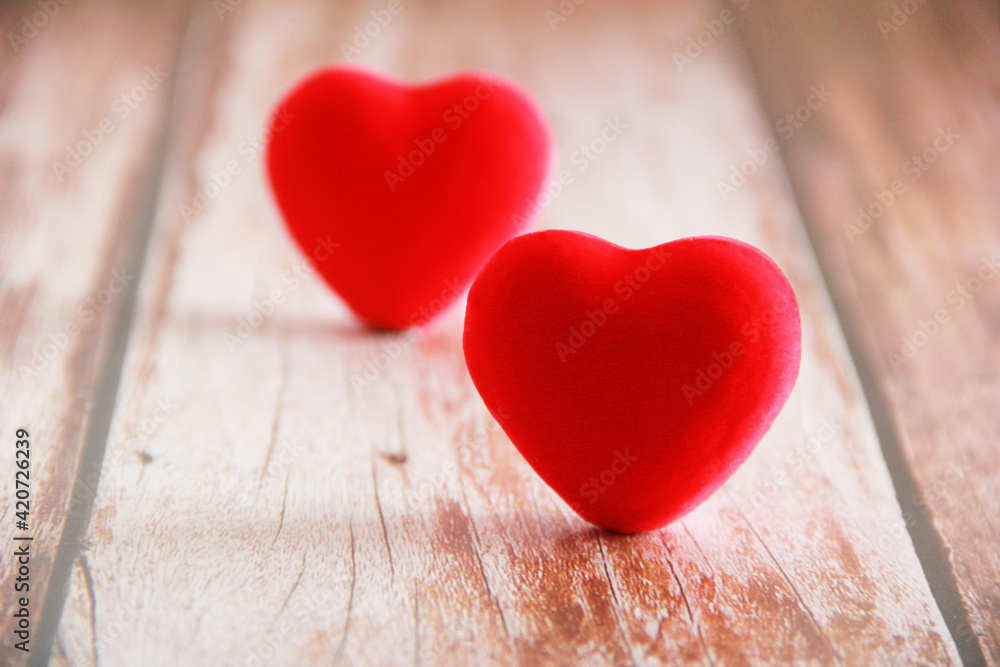 Fototapeta premium red velvet heart on wooden background