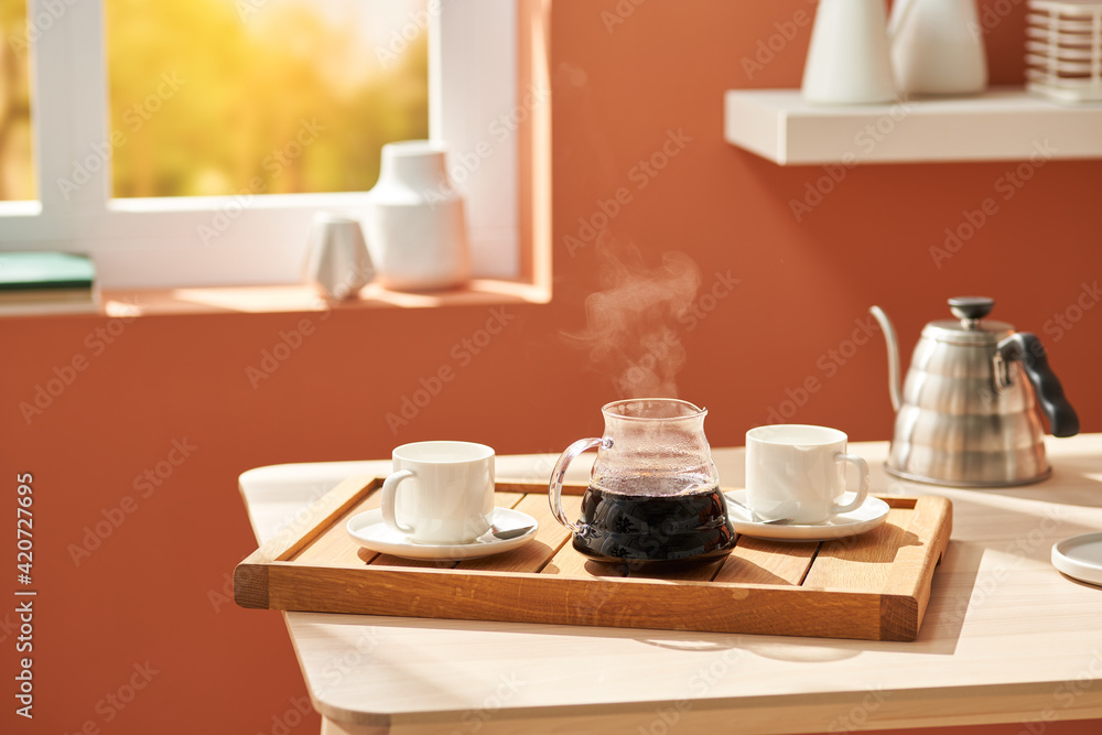 Tray with hot coffee and cups Tray with hot coffee and cups