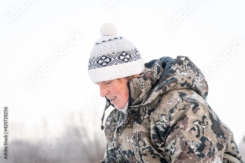 Portrait of a woman wearing a camouflage photo