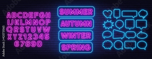 Summer, spring, autumn and winter neon signs on brick wall background.