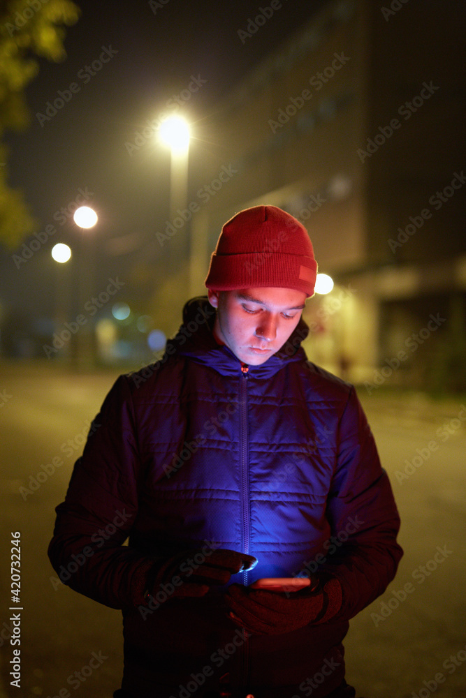 Young man using a phone Young man using a phone