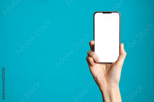 Hand showing empty screen of smartphone