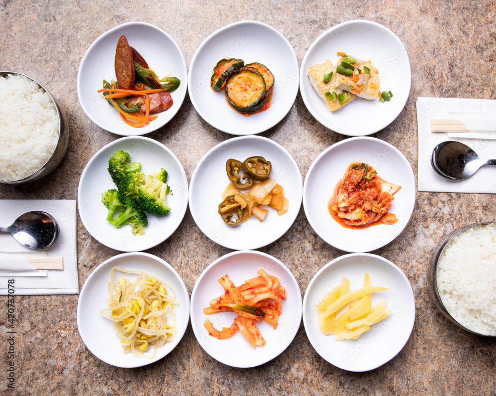Korean Banchan served with white steamed rice Korean Banchan served with white steamed rice