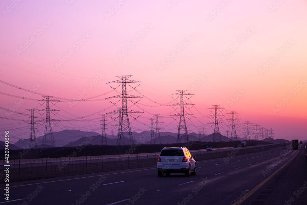 high-voltage electricity poles Tower - power station - distribute Electric energy , sunset