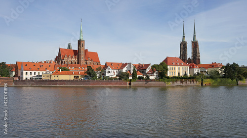 Wroclaw Cathedral of St. John the Baptist behind Oder River panoramic view, popular tourist destination, guided tour concept