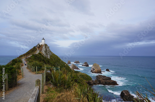 Nugget Point Lighthouse on the Catlins coast in New Zealand photo