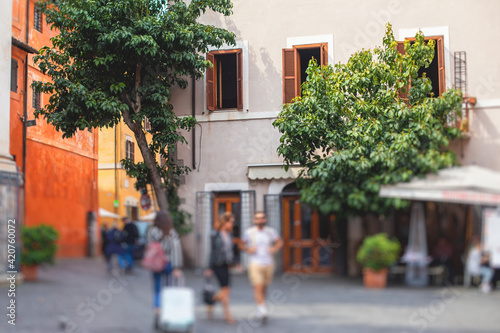 Fototapeta Naklejka Na Ścianę i Meble -  Trastevere district, Rome, Italy, view of rione Trastevere, Roma, with historical narrow streets, Municipio I, west bank of Tiber in Rome, Lazio, Italy, cozy streets with restaurants and architecture