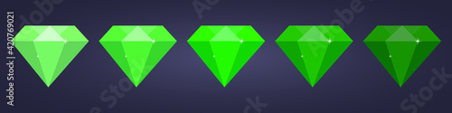 set of green flat diamond on dark background photo