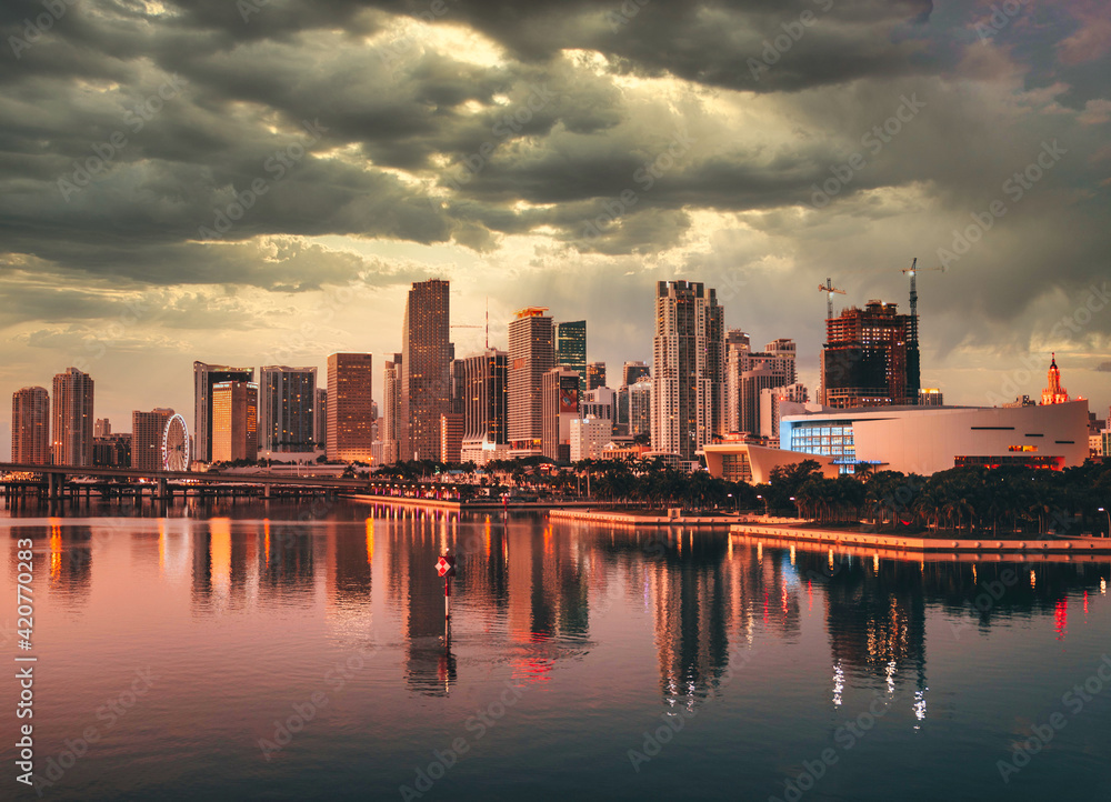 city skyline at sunset miami florida reflections beautiful sky cloud buildings water tower cute view 