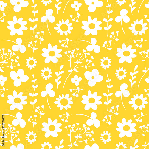 Seamless pattern with wildflowers. Vector illustration in simple hand drawn style and trendy yellow colors