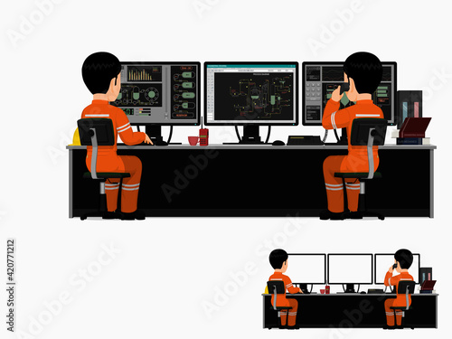 Two workers are working in control room