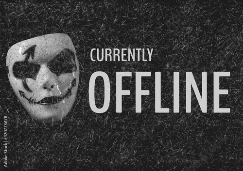 Digitally generated image of currently offline text against face mask on black background