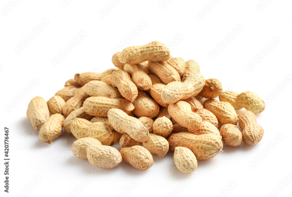 Unpeeled peanuts in nutshell pile Unpeeled peanuts in nutshell pile