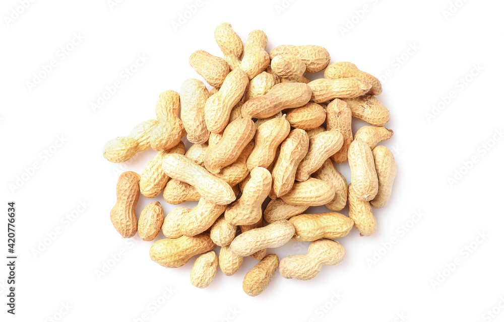 Unpeeled peanuts in nutshell pile Unpeeled peanuts in nutshell pile