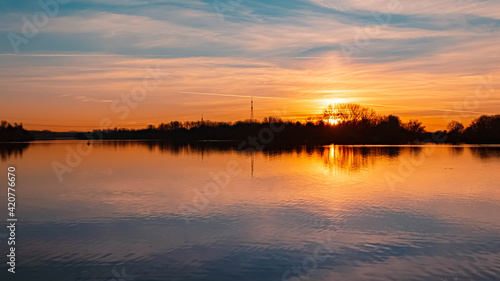 Beautiful sunset with reflections near Plattling  Isar  Bavaria  Germany