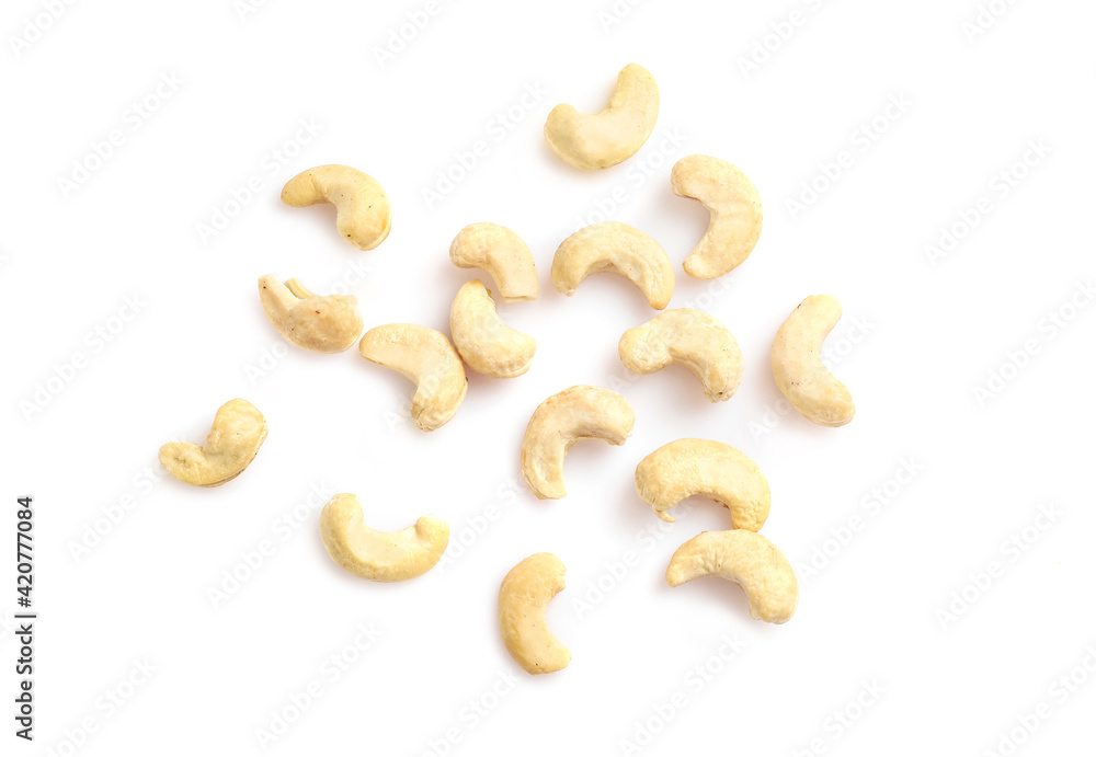 Tasty raw cashew nuts isolated on white Tasty raw cashew nuts isolated on white