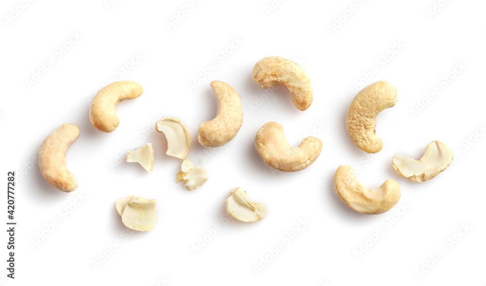 Tasty raw cashew nuts isolated on white Tasty raw cashew nuts isolated on white