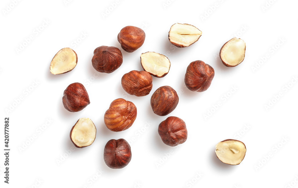 Tasty and nutritious hazelnuts isolated on white Tasty and nutritious hazelnuts isolated on white