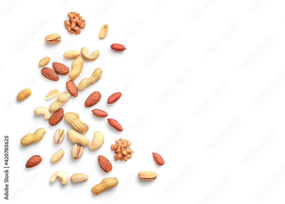 Mix of dry nuts isolated on white Mix of dry nuts isolated on white